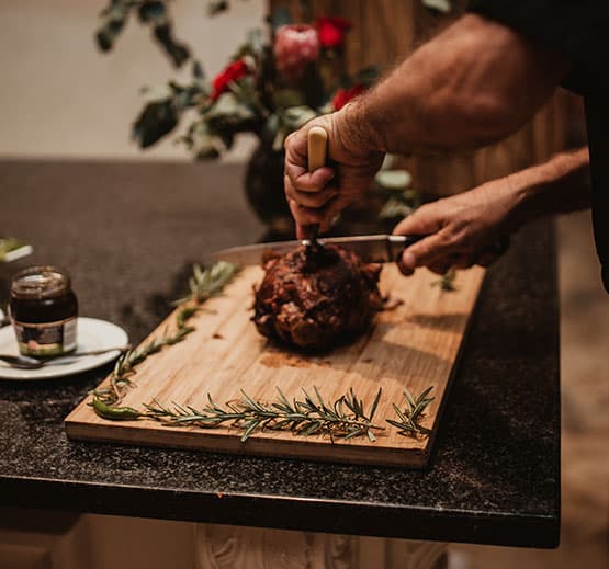 Beautifully plated wedding main course on a styled reception table